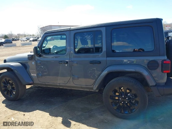 2023 Jeep Wrangler 4xe Sahara with VIN 1C4JJXP62PW696002, listed as a IAAI auction lot 41891127 with 44,567 mi miles. Bid and sale history available at carsss.com. Image 14.