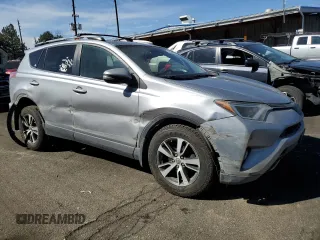 2018 Toyota RAV4 XLE with VIN JTMRFREV6JD244065, listed as a Copart auction lot 49099265 with 121,698 mi miles and Salvage Title. Bid and sale history available at carsss.com. Image 4.