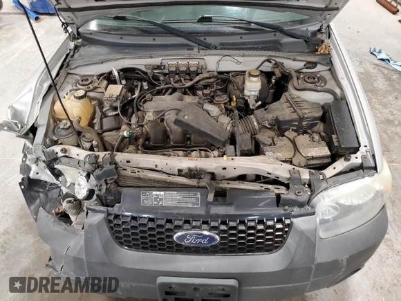 2005 Ford Escape XLT с VIN 1FMYU93185KA04997, выставлен на аукционе Copart как лот 57153325 с пробегом 121 348 миль миль и Списание • Salvage title. История ставок и продаж доступна на DreamBid. Изображение 12.