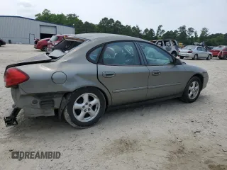 2002 Ford Taurus SES Standard with VIN 1FAFP55U42A184084, listed as a Copart auction lot 59822495 with 124,835 mi miles and Salvage title. Bid and sale history available at DreamBid. Image 3.