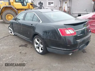 2010 Ford Taurus SHO with VIN 1FAHP2KT7AG132561, listed as a IAAI auction lot 31602484 with 118,333 mi miles and . Bid and sale history available at DreamBid. Image 3.