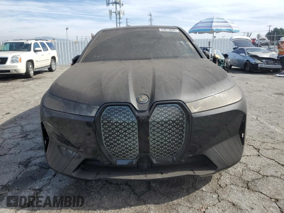 2023 BMW iX xDrive50 with VIN WB523CF0XPCL59062, listed as a Copart auction lot 43813935 with 7,788 mi miles and Salvage Title. Bid and sale history available at carsss.com. Image 5.