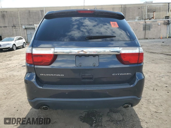 2013 Dodge Durango Citadel with VIN 1C4SDHET6DC592944, listed as a Copart auction lot 74306054 with 87,025 mi miles and Salvage Title. Bid and sale history available at carsss.com. Image 6.