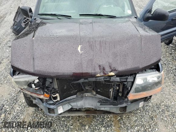 2004 Jeep Grand Cherokee Laredo with VIN 1J4GX48SX4C201569, listed as a Copart auction lot 58631585 with 271,124 mi miles and Salvage title. Bid and sale history available at DreamBid. Image 12.