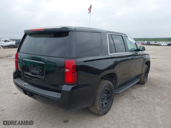 2019 Chevrolet Tahoe Commercial with VIN 1GNLCDECXKR231072, listed as a IAAI auction lot 41800007 with 100,101 mi miles. Bid and sale history available at carsss.com. Image 4.
