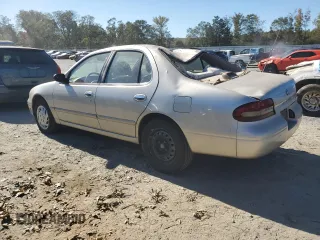 1996 Nissan Altima XE z VIN 1N4BU31D5TC104895, wystawiony jako Copart lot #77043684 z przebiegiem 133 113 mil mil oraz Szkoda całkowita • Salvage title. Historia ofert i sprzedaży dostępna na DreamBid. Obrazek 2.