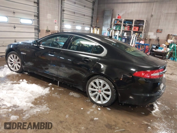 2014 Jaguar XF V6 SC with VIN SAJWJ0EF2E8U13746, listed as a IAAI auction lot 41608420 with 141,476 mi miles. Bid and sale history available at carsss.com. Image 3.