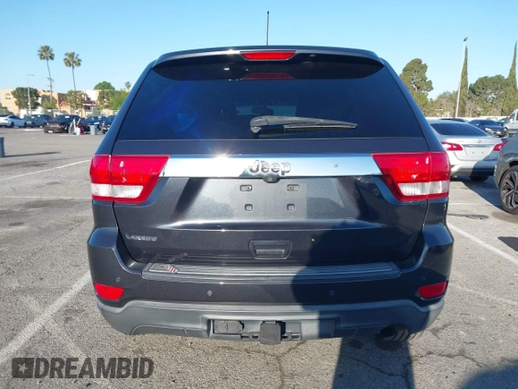 2013 Jeep Grand Cherokee Laredo with VIN 1C4RJEAG2DC643290, listed as a IAAI auction lot 41751696 with 125,258 mi miles. Bid and sale history available at carsss.com. Image 16.