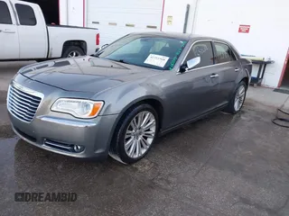 2011 Chrysler 300 with VIN 2C3CA6CTXBH580203, listed as a IAAI auction lot 41751968 with 173,916 mi miles. Bid and sale history available at carsss.com. Image 2.