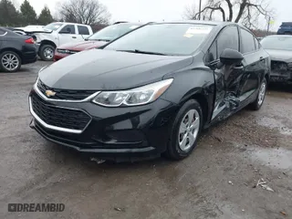 2018 Chevrolet Cruze LS with VIN 1G1BC5SM9J7235981, listed as a IAAI auction lot 41506436 with 80,602 mi miles. Bid and sale history available at carsss.com. Image 2.