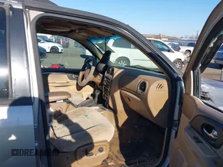 2002 GMC Envoy SLT with VIN 1GKDT13S822304832, listed as a IAAI auction lot 40874054 with 132,883 mi miles. Bid and sale history available at carsss.com. Image 5.