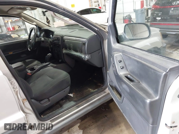 2004 Jeep Grand Cherokee Laredo with VIN 1J4GW48S44C161864, listed as a IAAI auction lot 42764536 with 143,833 mi miles and . Bid and sale history available at DreamBid. Image 5.