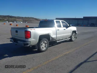 2014 Chevrolet Silverado 1500 LT with VIN 1GCVKREC1EZ134204, listed as a IAAI auction lot 40889755 with 174,575 mi miles and . Bid and sale history available at DreamBid. Image 4.
