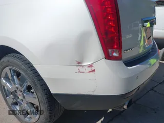 2011 Cadillac SRX Premium Collection z VIN 3GYFNCEYXBS579760, wystawiony jako IAAI lot #42238707 z przebiegiem Nie podano mil oraz . Historia ofert i sprzedaży dostępna na DreamBid. Obrazek 6.