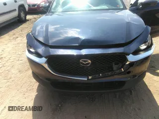 2022 Mazda CX-30 S Carbon Edition with VIN 3MVDMBCL6NM423255, listed as a IAAI auction lot 42209829 with 51,589 mi miles and . Bid and sale history available at DreamBid. Image 6.