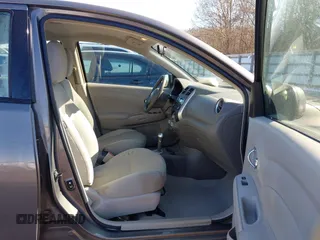 2014 Nissan Versa SV with VIN 3N1CN7AP9EL819833, listed as a IAAI auction lot 41351616 with 109,956 mi miles. Bid and sale history available at carsss.com. Image 5.