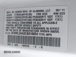 2012 Honda Odyssey EX-L with VIN 5FNRL5H62CB010054, listed as a IAAI auction lot 42040117 with 189,566 mi miles and . Bid and sale history available at carsss.com. Image 9.