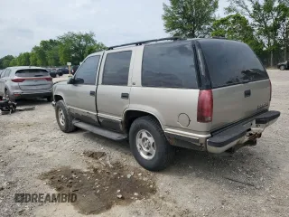 1999 Chevrolet Tahoe Z71 with VIN 1GNEK13R6XJ301562, listed as a Copart auction lot 59684595 with 200,561 mi miles and Salvage title. Bid and sale history available at DreamBid. Image 2.