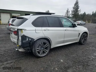 2015 BMW X5 M with VIN 5YMKT6C54F0C89266, listed as a Copart auction lot 45340675 with 22,347 mi miles and Salvage Title. Bid and sale history available at carsss.com. Image 3.