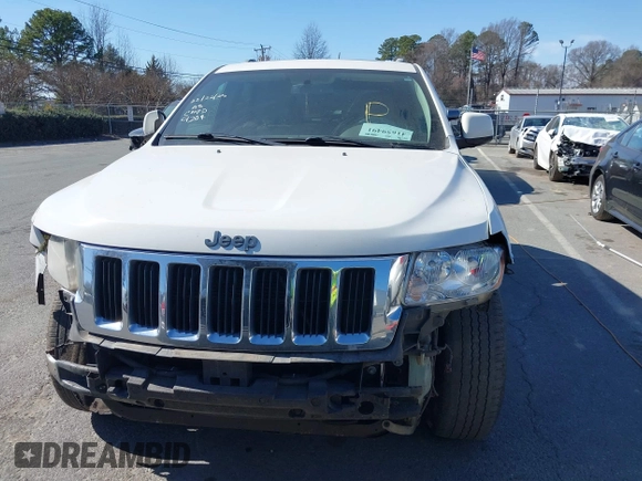 2012 Jeep Grand Cherokee Laredo with VIN 1C4RJFAT4CC229204, listed as a IAAI auction lot 41659491 with 141,143 mi miles. Bid and sale history available at carsss.com. Image 12.