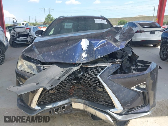 2016 Lexus RX 350 with VIN 2T2BZMCA5GC008794, listed as a IAAI auction lot 42335067 with 122,807 mi miles and . Bid and sale history available at DreamBid. Image 12.