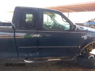 2000 Ford F-150 XL z VIN 1FTRX18L1YNA05567, wystawiony jako IAAI lot #42054536 z przebiegiem 245 018 mil mil oraz . Historia ofert i sprzedaży dostępna na DreamBid. Obrazek 13.