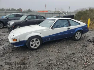 1984 Toyota Supra z VIN JT2MA67L5E0133497, wystawiony jako Copart lot #43439285 z przebiegiem 187 882 mil mil oraz Czysty tytuł • Clean title. Historia ofert i sprzedaży dostępna na DreamBid. Obrazek 1.