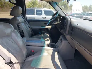 2002 Chevrolet Tahoe LS z VIN 1GNEK13Z82J150300, wystawiony jako IAAI lot #42116707 z przebiegiem 224 512 mil mil oraz . Historia ofert i sprzedaży dostępna na DreamBid. Obrazek 5.