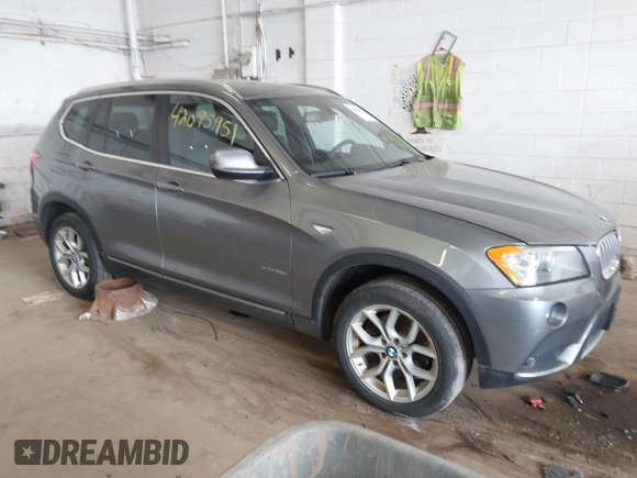 2013 BMW X3 xDrive28i with VIN 5UXWX9C55D0A32404, listed as a IAAI auction lot 42095951 with 165,301 mi miles. Bid and sale history available at carsss.com. Image 1.