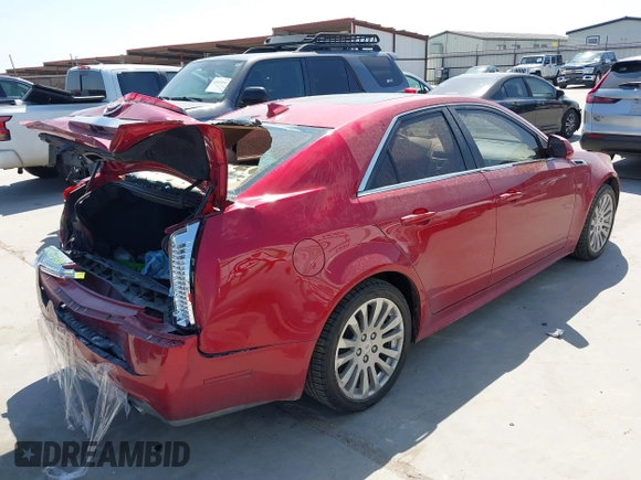 2012 Cadillac CTS Premium z VIN 1G6DP5E3XC0116312, wystawiony jako IAAI lot #41804403 z przebiegiem 148 570 mil mil oraz . Historia ofert i sprzedaży dostępna na DreamBid. Obrazek 4.