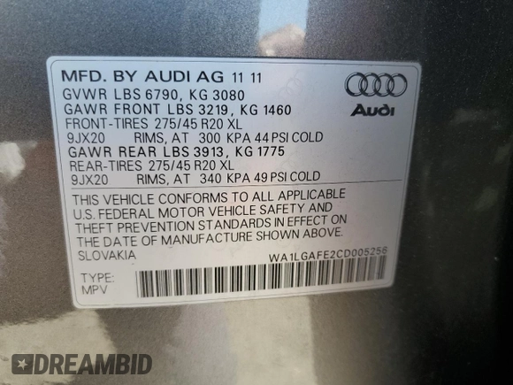 2012 Audi Q7 Premium Plus with VIN WA1LGAFE2CD005256, listed as a Copart auction lot 52233385 with 174,182 mi miles and Salvage title. Bid and sale history available at DreamBid. Image 13.