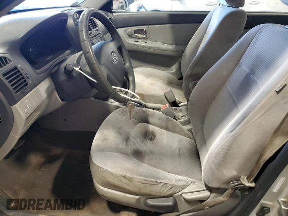 2009 Kia Spectra EX with VIN KNAFE221295652113, listed as a Copart auction lot 47983865 with 173,835 mi miles and Non Repairable. Bid and sale history available at carsss.com. Image 7.