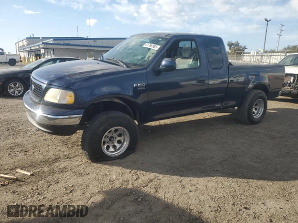 2003 Ford F-150 XL with VIN 1FTRX17L13NA95202, listed as a Copart auction lot 87766385 with 124,961 mi miles and Salvage Title. Bid and sale history available at carsss.com. Image 1.