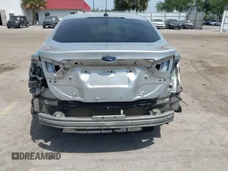 2014 Ford Fusion Titanium with VIN 3FA6P0K99ER358244, listed as a IAAI auction lot 42085703 with 194,626 mi miles. Bid and sale history available at carsss.com. Image 6.