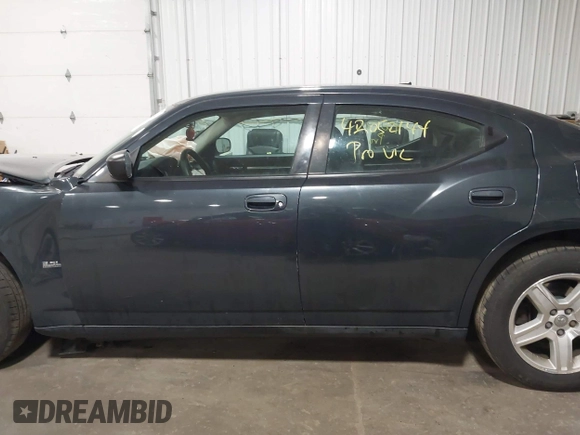 2008 Dodge Charger with VIN 2B3KA43G88H305583, listed as a IAAI auction lot 42052144 with 119,310 mi miles and . Bid and sale history available at DreamBid. Image 14.