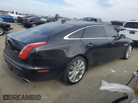 2015 Jaguar XJ with VIN SAJWA2GZ4F8V86379, listed as a Copart auction lot 42624615 with 55,803 mi miles and Salvage Title. Bid and sale history available at carsss.com. Image 3.