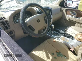 2005 Mercury Mariner Luxury z VIN 4M2CU56125DJ17538, wystawiony jako Copart lot #46948345 z przebiegiem 158 277 mil mil oraz Szkoda całkowita • Salvage title. Historia ofert i sprzedaży dostępna na DreamBid. Obrazek 8.