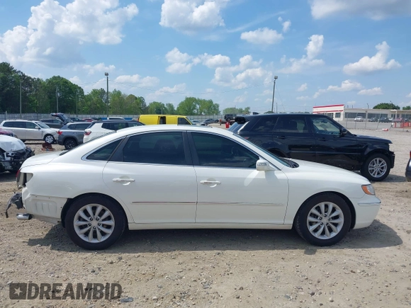 2007 Hyundai Azera SE z VIN KMHFC46F07A176082, wystawiony jako IAAI lot #42163164 z przebiegiem 146 021 mil mil oraz . Historia ofert i sprzedaży dostępna na DreamBid. Obrazek 14.