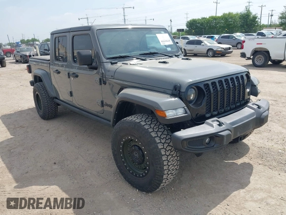 2021 Jeep Gladiator Sport S z VIN 1C6JJTAM1ML607525, wystawiony jako IAAI lot #41941550 z przebiegiem 59 283 mil mil oraz . Historia ofert i sprzedaży dostępna na DreamBid. Obrazek 1.