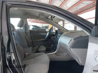2009 Toyota Corolla with VIN JTDBL40E69J036916, listed as a IAAI auction lot 41776387 with 185,749 mi miles. Bid and sale history available at carsss.com. Image 5.