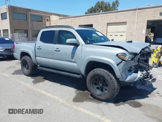 2018 Toyota Tacoma SR5 with VIN 3TMAZ5CN0JM065363, listed as a IAAI auction lot 42593273 with 78,238 mi miles and . Bid and sale history available at DreamBid. Image 1.