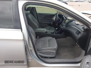 2014 Chevrolet Impala LT with VIN 2G1125S38E9102607, listed as a IAAI auction lot 41860235 with 128,599 mi miles and . Bid and sale history available at DreamBid. Image 5.