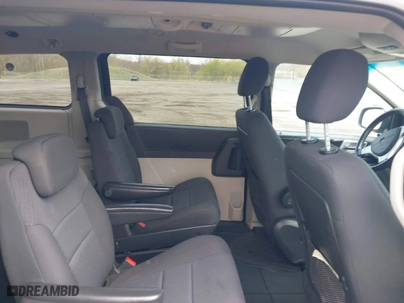 2010 Dodge Grand Caravan SXT with VIN 2D4RN5D11AR201781, listed as a IAAI auction lot 42028688 with 147,563 mi miles. Bid and sale history available at carsss.com. Image 8.
