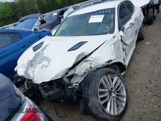 2018 Kia Stinger with VIN KNAE15LA1J6029913, listed as a IAAI auction lot 41477274 with 105,479 mi miles. Bid and sale history available at carsss.com. Image 18.