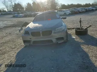 2014 BMW M5 z VIN WBSFV9C57ED593159, wystawiony jako Copart lot #87475634 z przebiegiem Nie podano mil oraz Szkody całkowita. Historia ofert i sprzedaży dostępna na DreamBid. Obrazek 10.