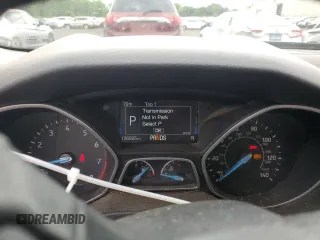 2017 Ford Focus Titanium z VIN 1FADP3N29HL240527, wystawiony jako Copart lot #62891695 z przebiegiem 126 926 mil mil oraz Szkoda całkowita • Salvage title. Historia ofert i sprzedaży dostępna na DreamBid. Obrazek 9.