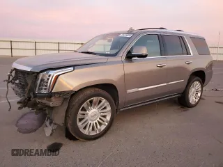 2019 Cadillac Escalade Platinum with VIN 1GYS4DKJ4KR382360, listed as a Copart auction lot 79478804 with 77,523 mi miles and Salvage title. Bid and sale history available at DreamBid. Image 1.