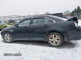 2011 Ford Taurus SEL with VIN 1FAHP2EW4BG148921, listed as a IAAI auction lot 41216094 with 248,814 mi miles. Bid and sale history available at carsss.com. Image 14.