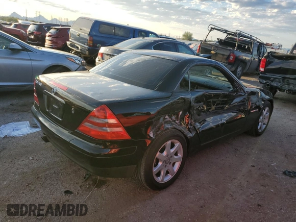 1999 Mercedes-Benz SLK-Class with VIN WDBKK47F1XF124854, listed as a Copart auction lot 73160604 with 55,730 mi miles and Salvage Title. Bid and sale history available at carsss.com. Image 3.