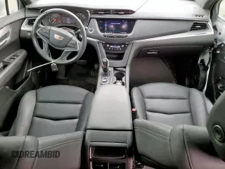 2020 Cadillac XT5 Luxury FWD z VIN 1GYKNAR40LZ236650, wystawiony jako Copart lot #56524945 z przebiegiem 43 164 mil mil oraz Szkoda całkowita • Salvage title. Historia ofert i sprzedaży dostępna na DreamBid. Obrazek 8.